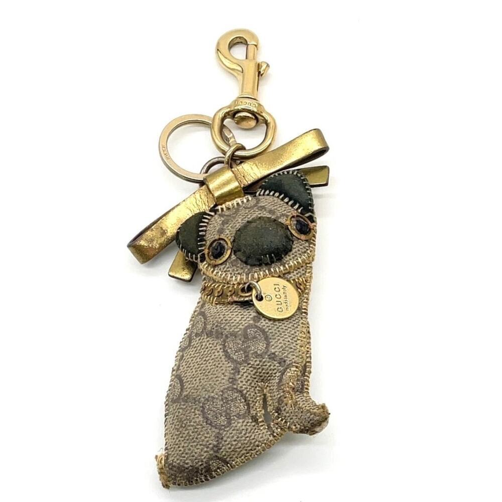 Gucci Guccioli Oliver Pug dog bag charm in beige and brown GG Supreme canvas